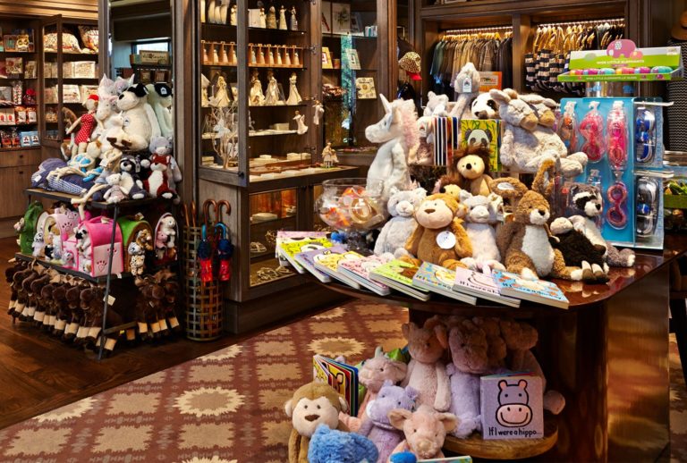 Gift shop stocked with stuffed animals, swimming goggles, books and trinkets