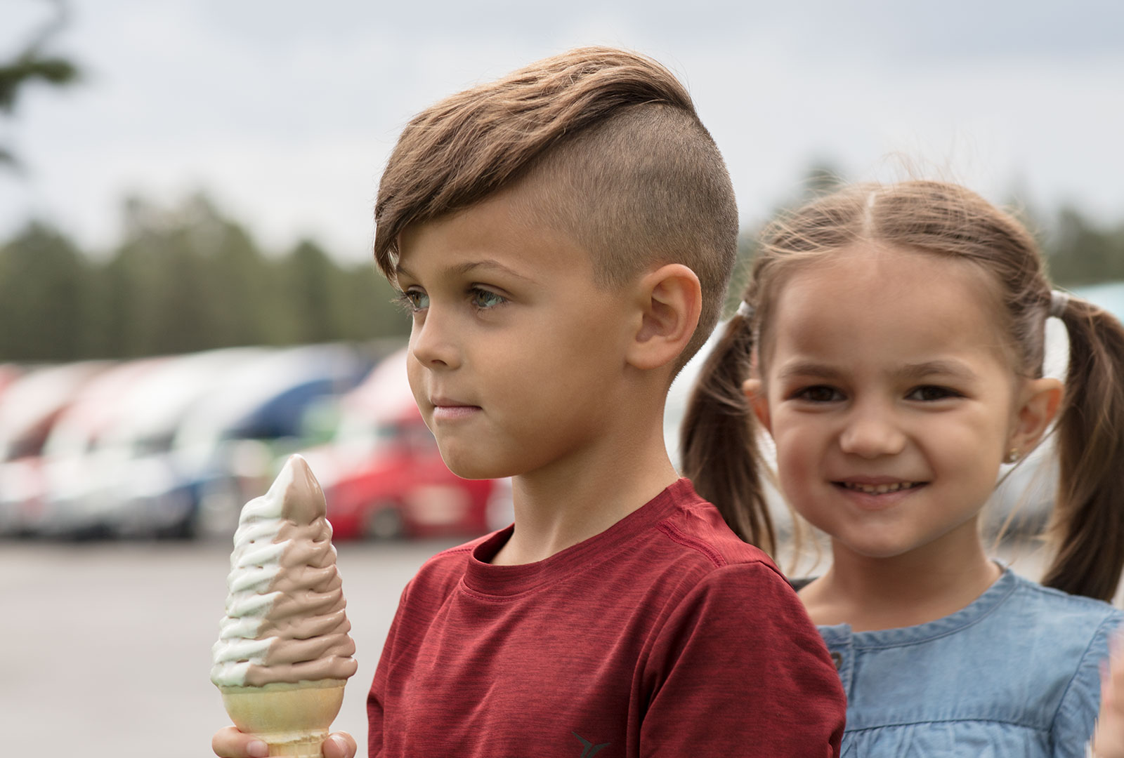 Two children enjoy Little America Hotel's famed soft-serve ice cream