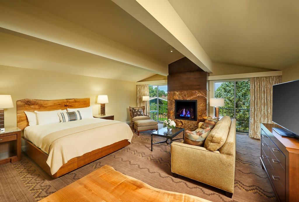 Bedroom and fireplace of the Presidential Suite