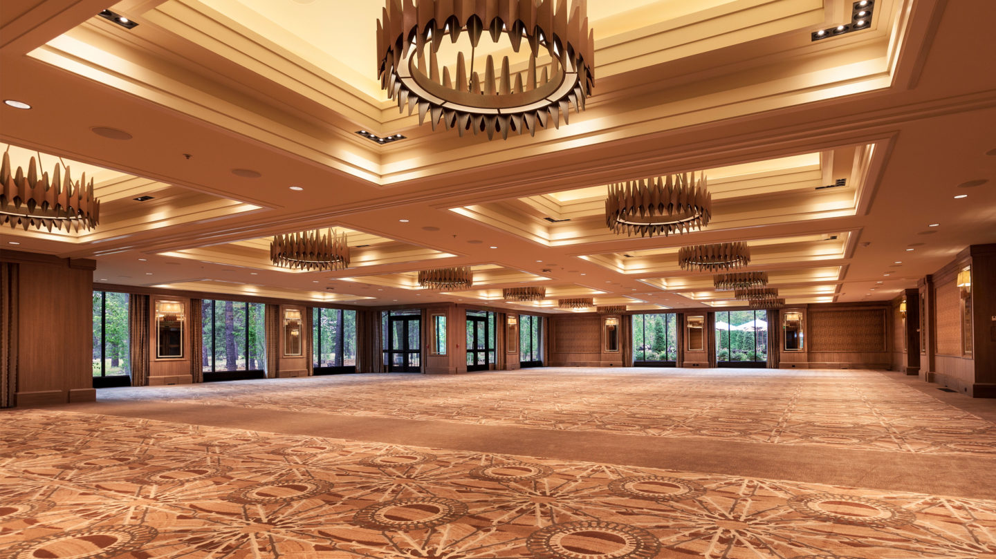 Empty Grand Ballroom with floor to ceiling windows and wood chandeliers