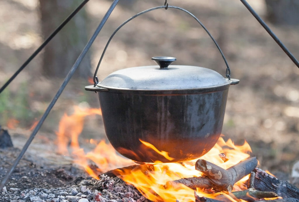 Dutch Oven Cooking over an open fire in the woods