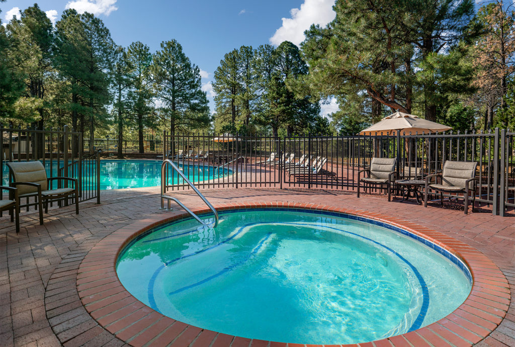 Overview of the hot tub and pool at Little America Flagstaff.