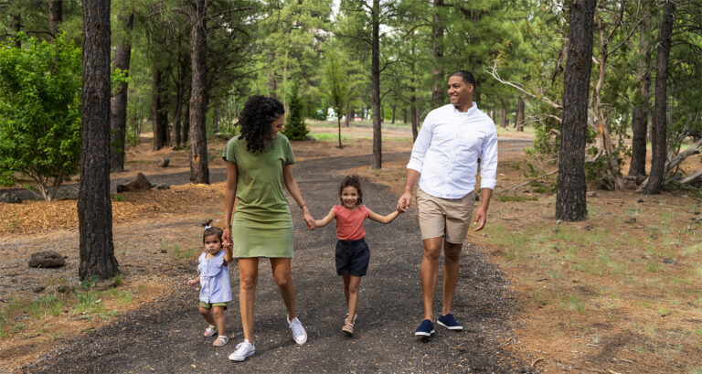 family walking on trail